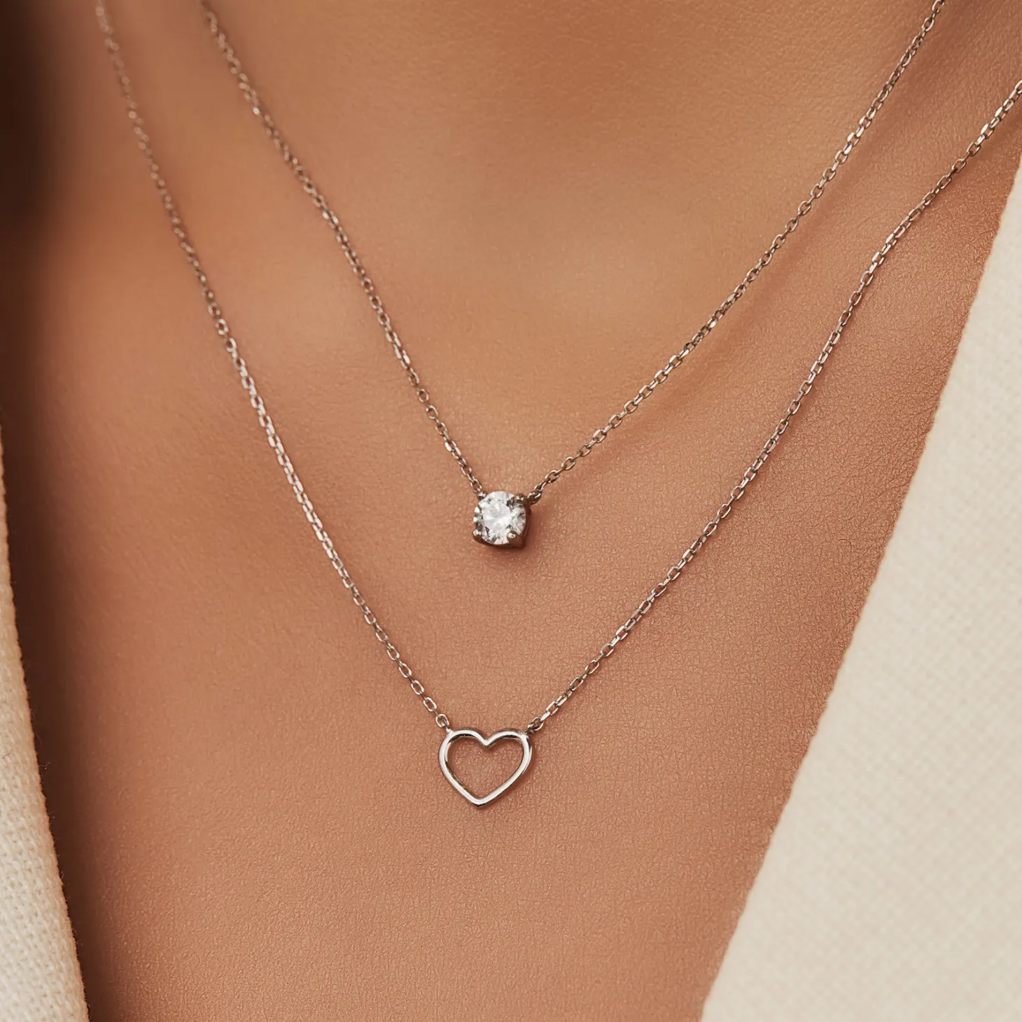 Isabel Bernard Cadeau d'Isabel 14 karaat witgouden collier en armband giftset met hartje Store