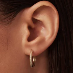 Isabel Bernard Le Marais Merle 14 karaat gouden creolen met zirkonia (15.5 mm) Shop